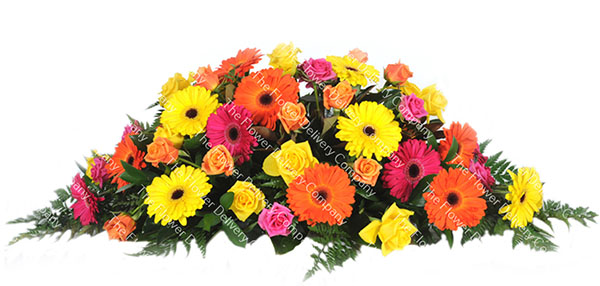 bright-cheerful-spray Bright & Cheerful Casket Spray Funeral Flowers