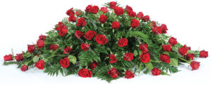 prem-rose-spray Red Rose Casket Spray Funeral Flowers